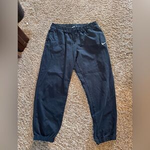 Nike Men's Black Sweatpants with White Swoosh